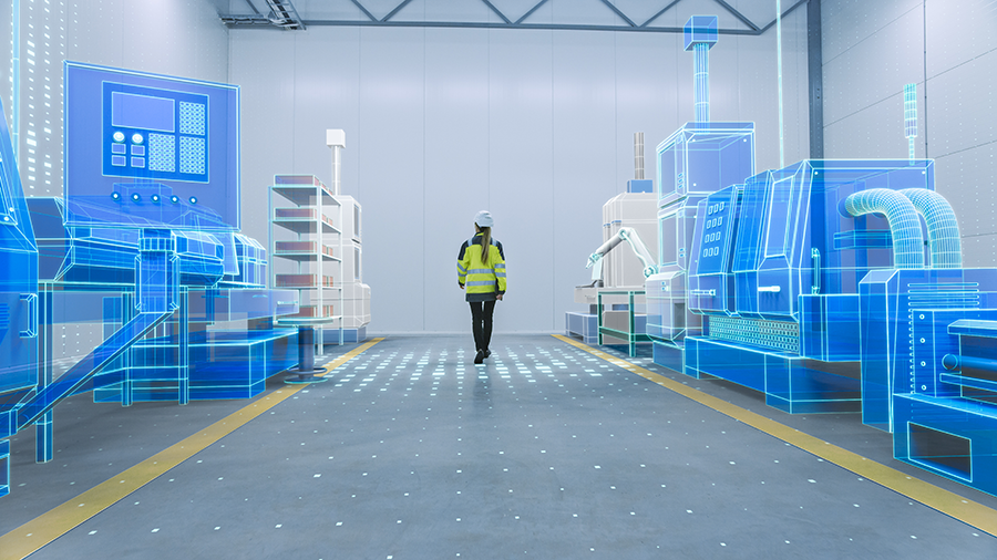 Insinööri kävelee simuloidussa tehdasympäristössä. Engineer walks through factory workshop with augmented reality.